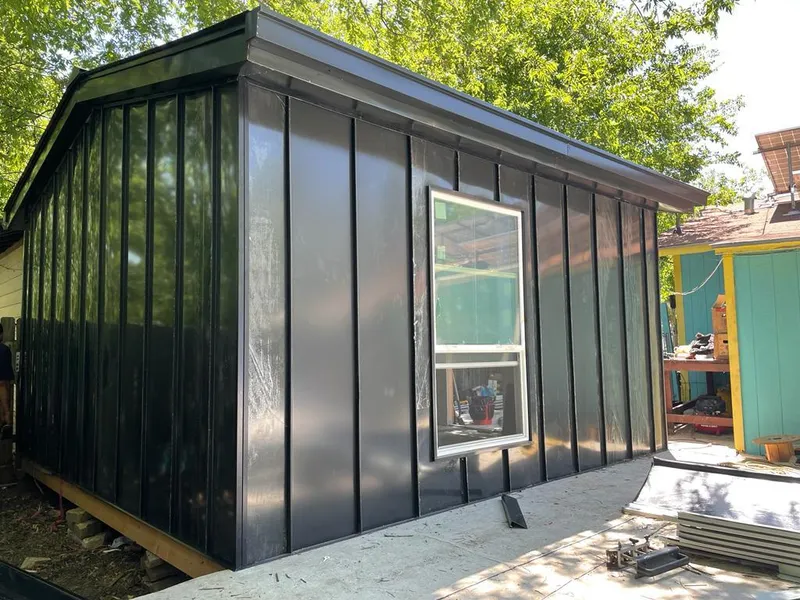 Black standing seam metal wall panels for Roof Inspection in Westfield