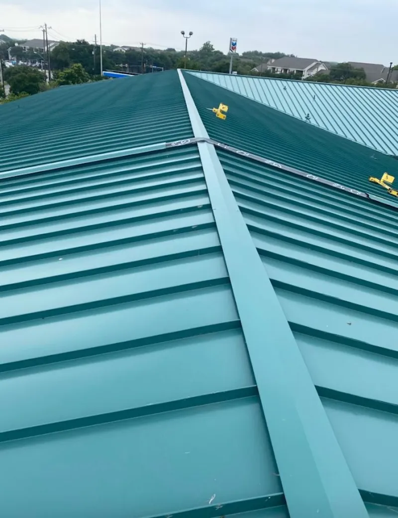 Green commercial metal roof ridge and valley for Metal Roof Repair in Westfield